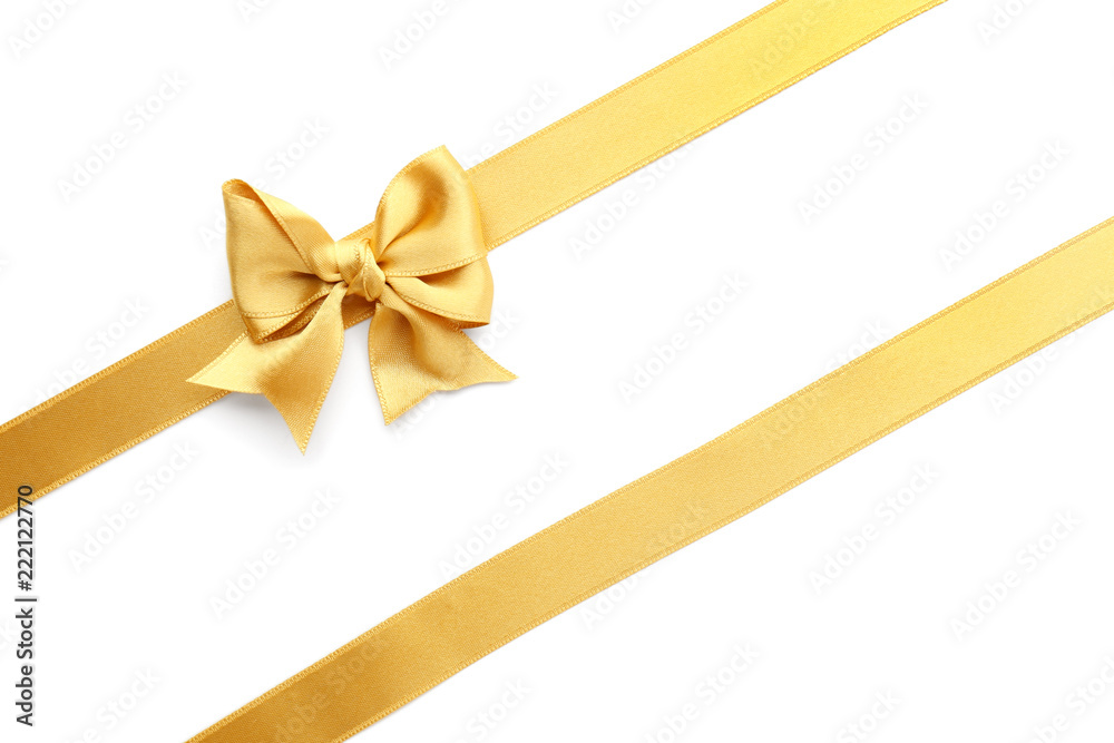 Golden ribbons with bow on white background Golden ribbons with bow on white background