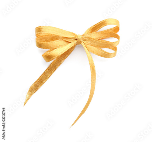Beautiful bow from golden ribbon on white background © Pixel-Shot