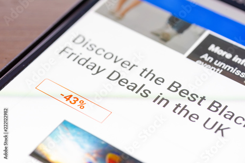 Discover Best Black Friday Deals in UK text message on smartphone screen closeup
