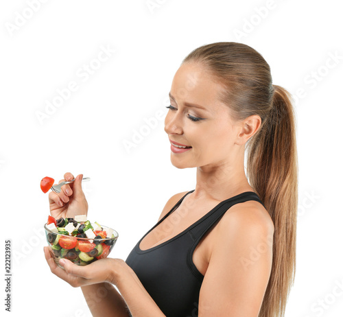 Sporty woman eating fresh v...