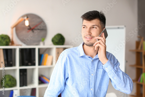 Businessman talking on phon...
