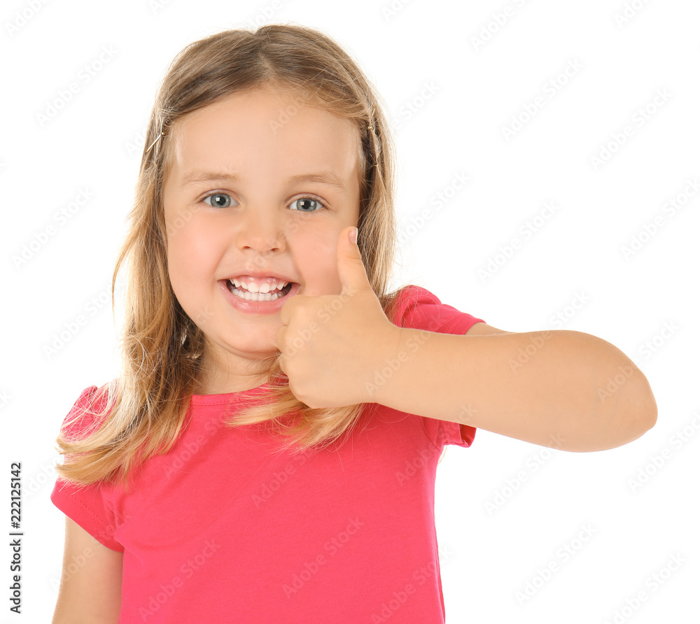 Cute little girl showing thumb-up gesture on white background Cute little girl showing thumb-up gesture on white background