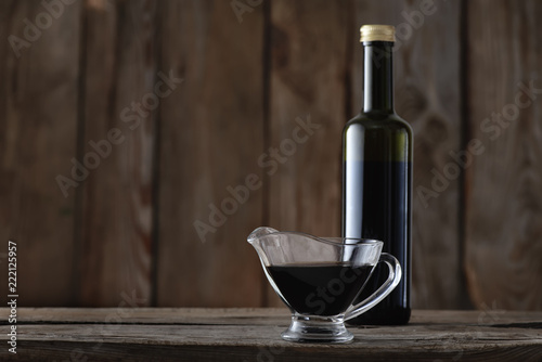 Balsamic vinegar in a bottle photo