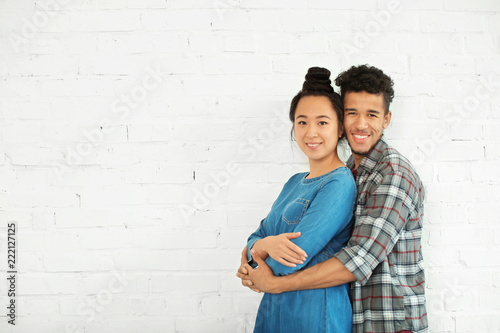 Happy interracial couple in...