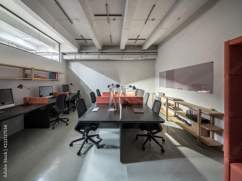 Stylish office in loft style with light walls Stylish office in loft style with light walls