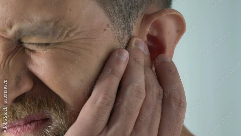 Ageing male has ear ache after catching draft, bacterial infection, otitis pain Ageing male has ear ache after catching draft, bacterial infection, otitis pain