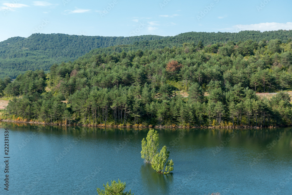 A small lake in Navarre under the blue sky