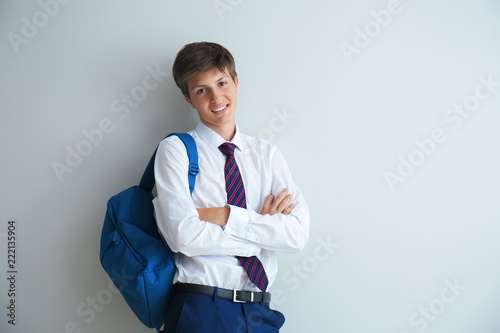 Teenage boy with backpack o...