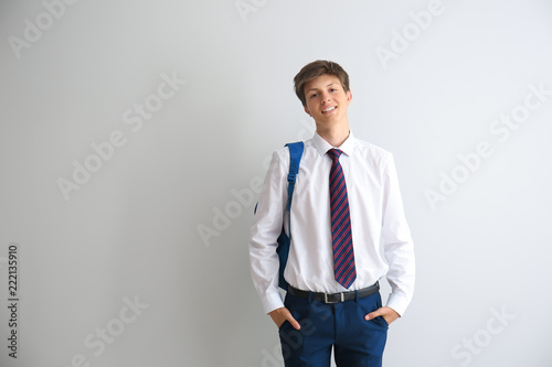 Teenage boy with backpack o...