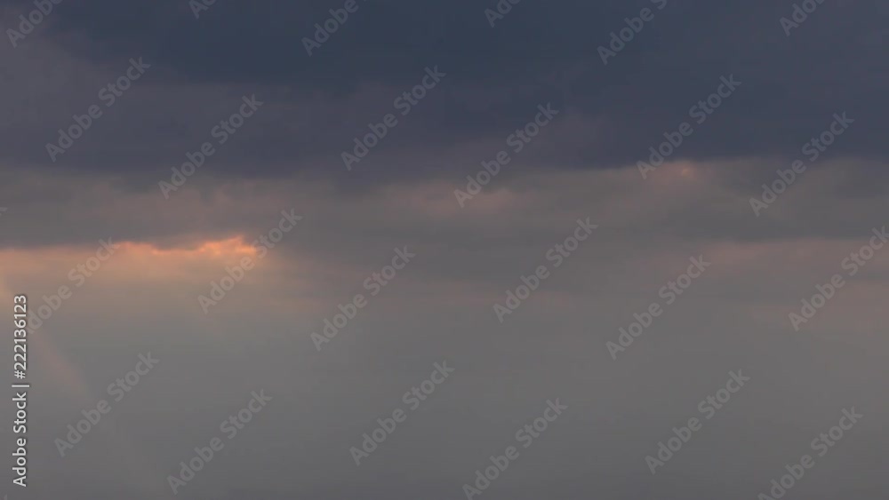 Dark clouds. Calm before the storm. The cataclysm is coming. The rays of the sun pass through the cumulus. Dark clouds. Calm before the storm. The cataclysm is coming. The rays of the sun pass through the cumulus.