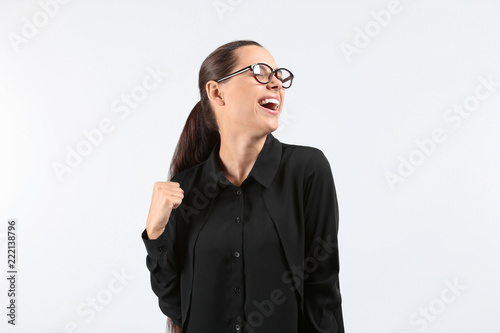 Happy successful young woma...