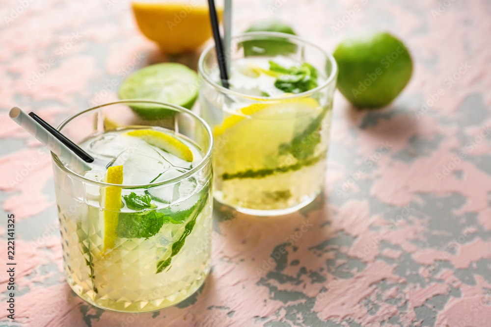 Glasses of fresh mojito on light table Glasses of fresh mojito on light table