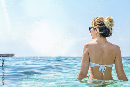 Woman in the sea, Cyprus. Beautiful Summer seaside view. Enjoying sunny days....