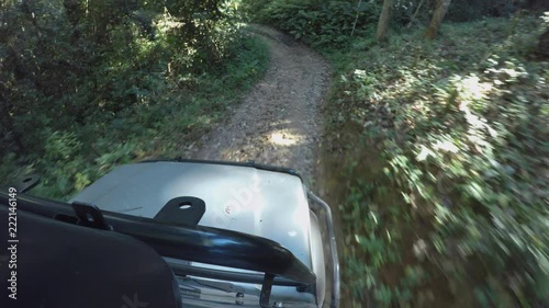 POV 4x4 driving jeep vehicle Wilderness safari mountain forest dirt road Chiangmai Thailand