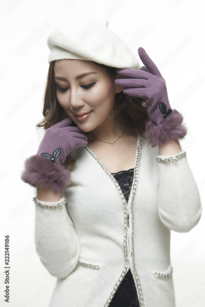 Asian mature sexy girl in white sweater and white hat Asian mature sexy girl in white sweater and white hat