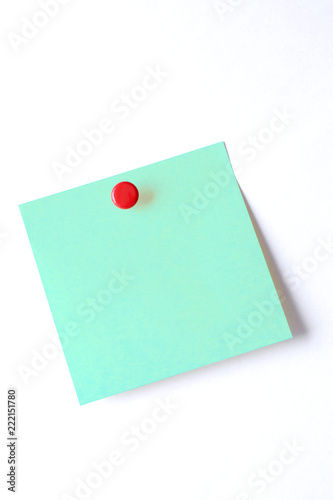 blank postit sticky note with push pin isolated on white background