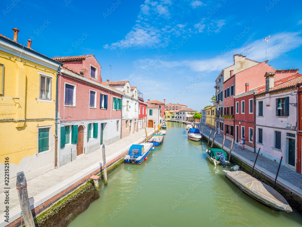 Among the canals of the island of Murano, known for Murano glass.