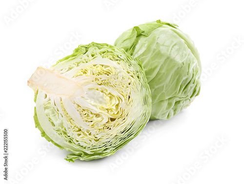 Whole and cut cabbages on white background