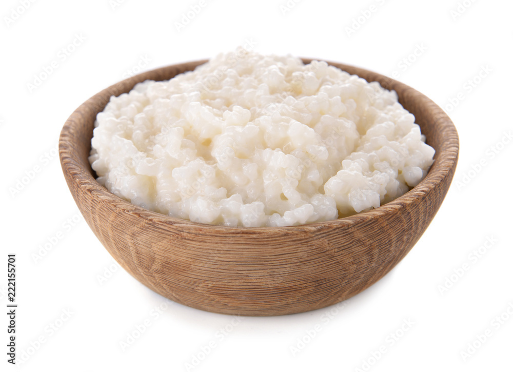 Delicious rice pudding in bowl on white background Delicious rice pudding in bowl on white background