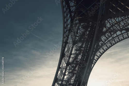 Piece of Tour Eiffel - Eiffel tower - against blue sky, Paris, France. Low angle.