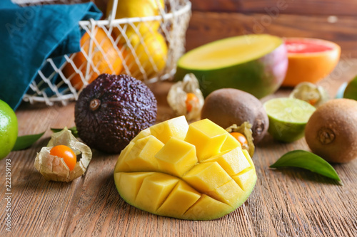 Fototapeta Naklejka Na Ścianę i Meble -  Various delicious exotic fruits on wooden table