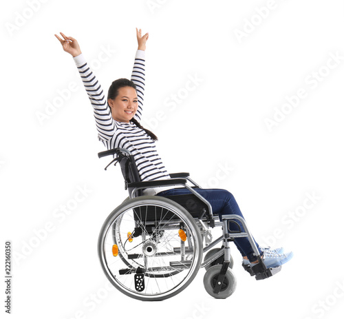 Happy Asian woman in wheelchair on white background