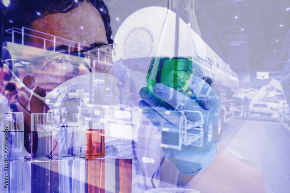 Double exposure Oil Research Scientist with oil tank, science concept. Double exposure Oil Research Scientist with oil tank, science concept.