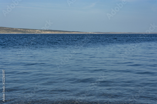 Stone beach and clear blue sea in Croatia. 