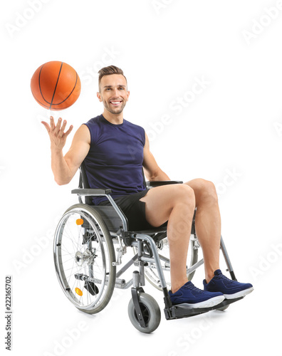 Young basketball player sit...