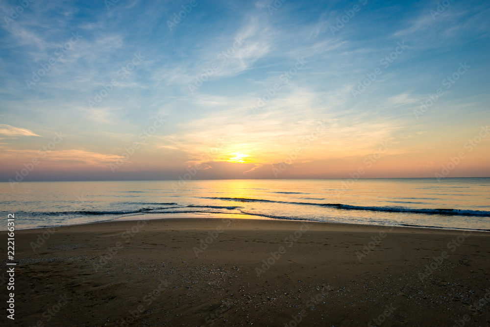 Sunrise on the sea beach