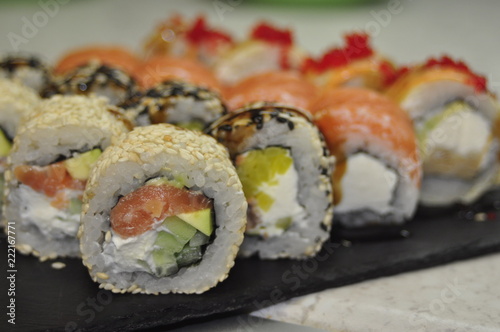 food, sushi, fish, rice, japanese, roll, meal, salmon, dinner, seafood, gourmet, japan, cuisine, maki, healthy, lunch, raw, traditional, asia, dish, fresh, white, plate, meat, snack
