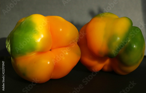 red and yellow peppers  colorful background photo