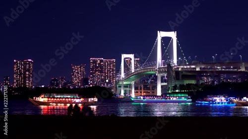 お台場の夜景 ライトアップされた橋と屋形船 photo