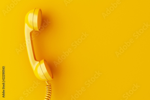 3d phone reciever on yellow background.
