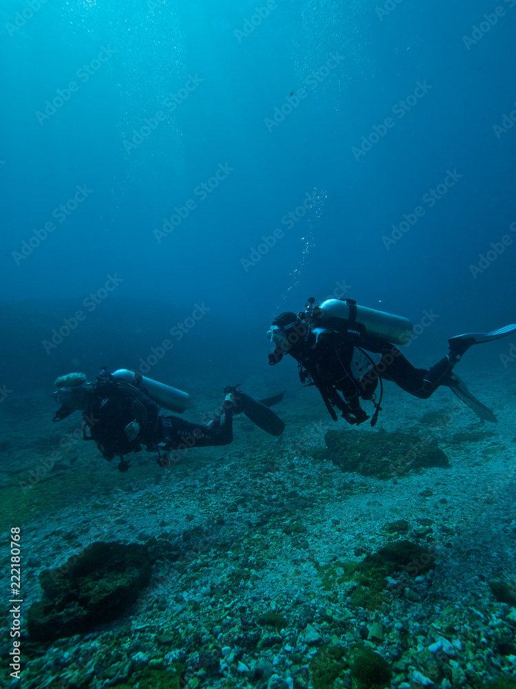 Divers exploring