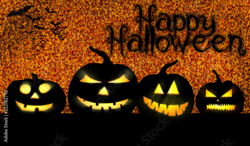 vier Halloweenkürbisse mit gruseligen Gesichtern