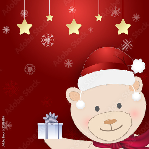 Teddy bear and gift box with christmas decoration on red background