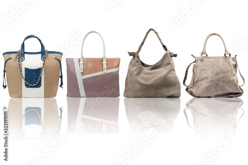 Beige female handbags collection isolated on white background.Front view. 