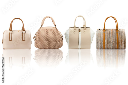 Beige handbags collection isolated on white background.Front view.
