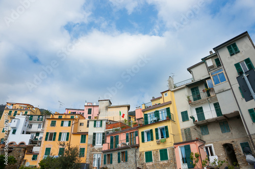 Typical arhitecture and colors of terrace homes in Italian village