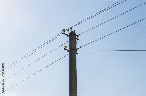 pole and wires on the sky background