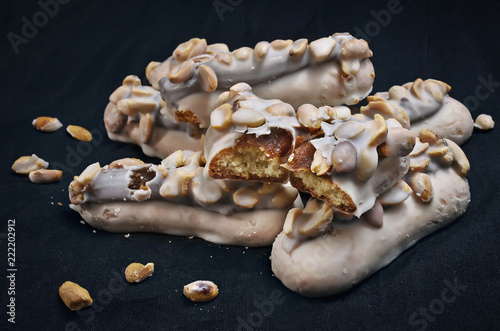white glaze cookies with peanuts