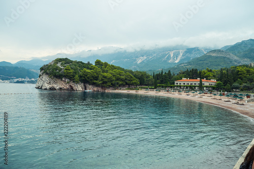 A beautiful park near a villa on the sea photo