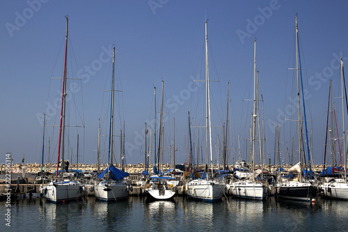 Yachts and boats in the port by the sea