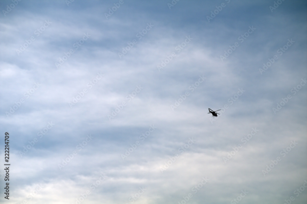 helicopter,sky,blue,cloud,travel,flying,air,fly helicopter,sky,blue,cloud,travel,flying,air,fly