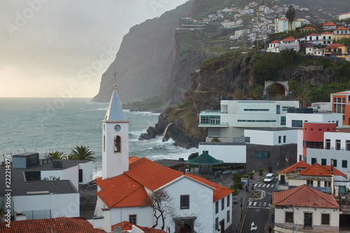 View of São Sebastião church with Cape Girão, in Câmara de Lobos, Madeira photo