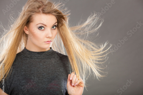 Attractive blonde woman with windblown hair