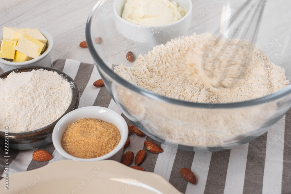 Baking ingredients on kitchen table white background, top view. Baking ingredients on kitchen table white background, top view.