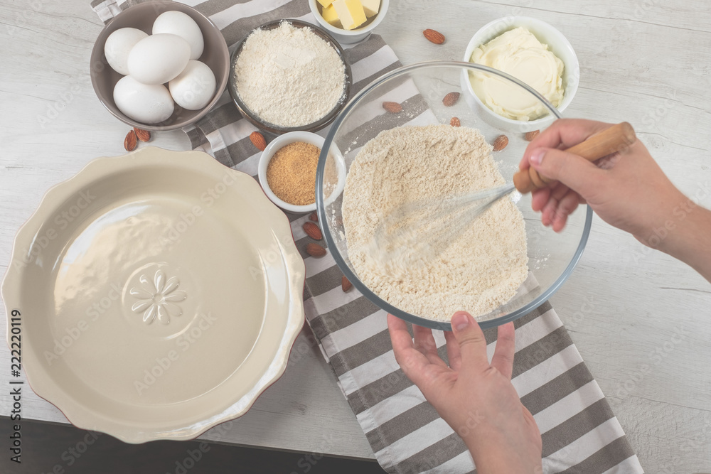 Baking ingredients on kitchen table white background, top view. Baking ingredients on kitchen table white background, top view.