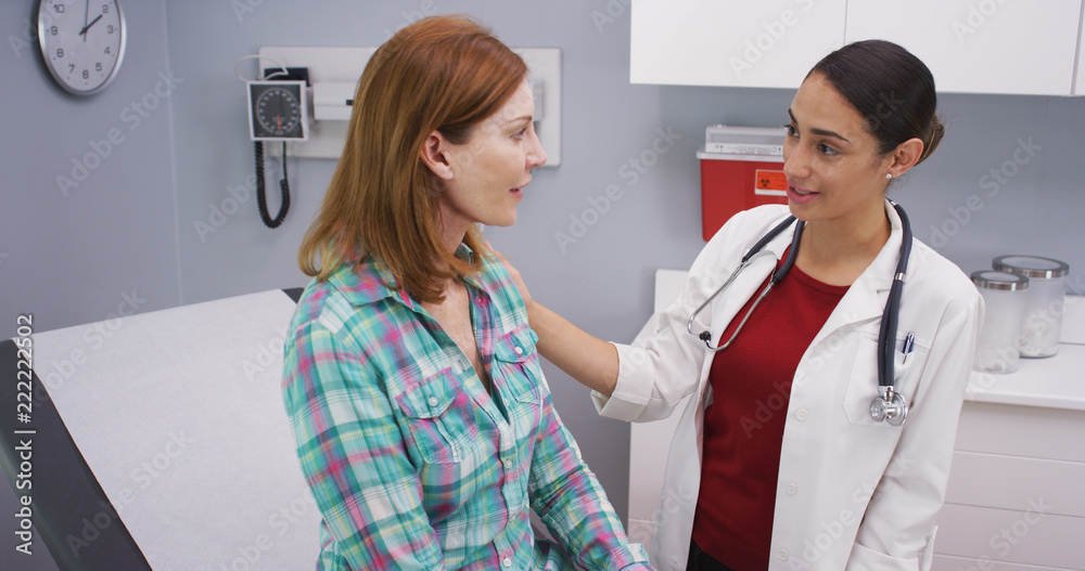 Ταπετσαρία Close up of young latina doctor giving senior patient good news about future health